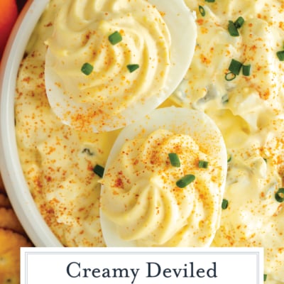 overhead shot of deviled eggs over over bowl of dip with text overlay