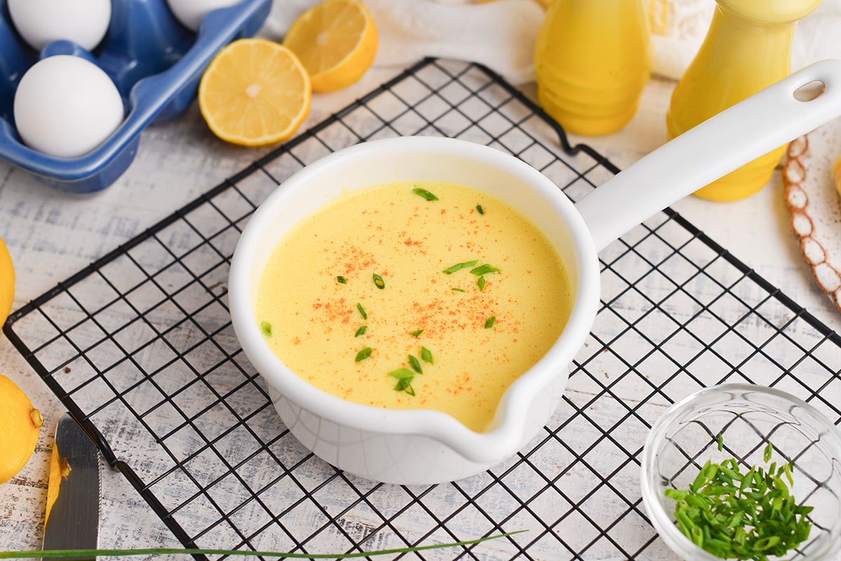 easy hollandaise sauce in white bowl
