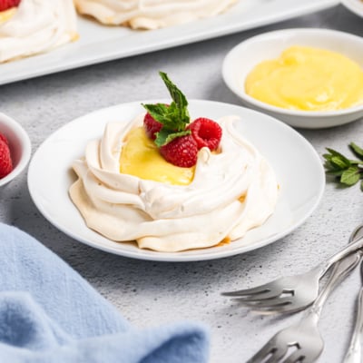 angled shot of lemon curd meringue on plate