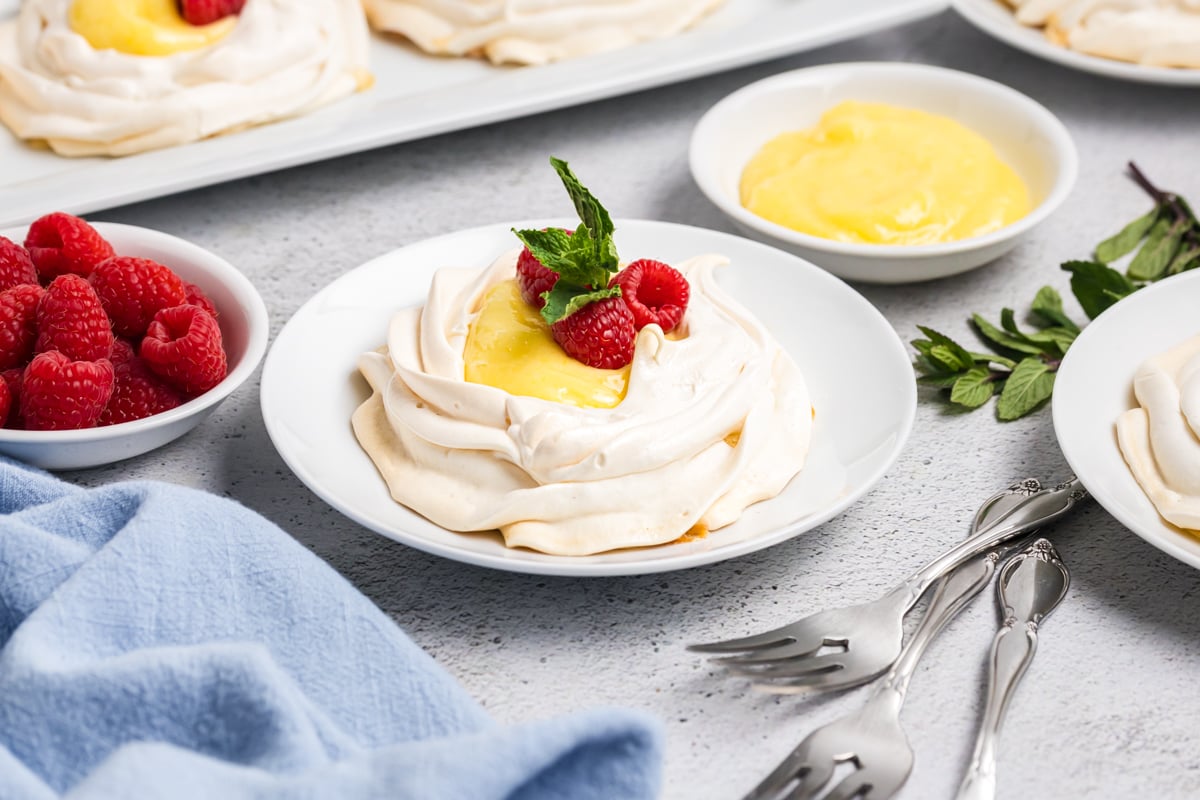 angled shot of lemon curd meringue on plate