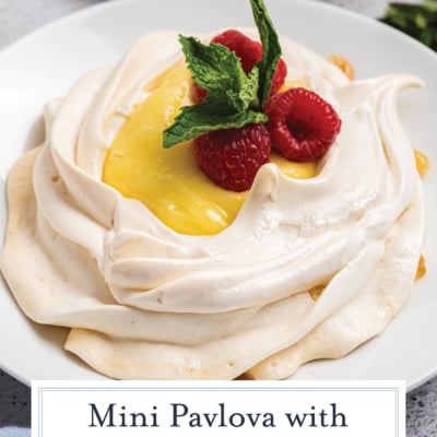 angled shot of mini pavlova with lemon curd with text overlay