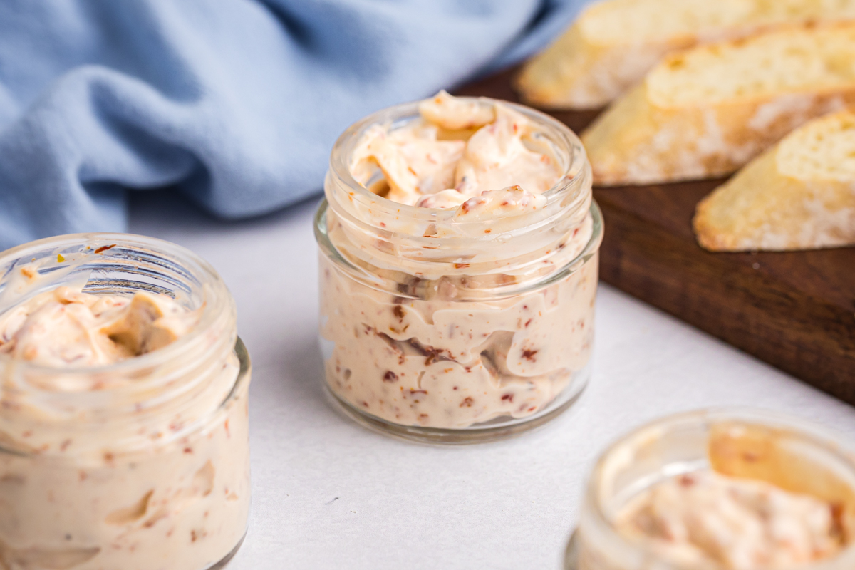 angled shot of jar of homemade aioli