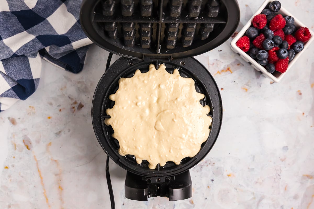 overhead shot of batter in waffle iron