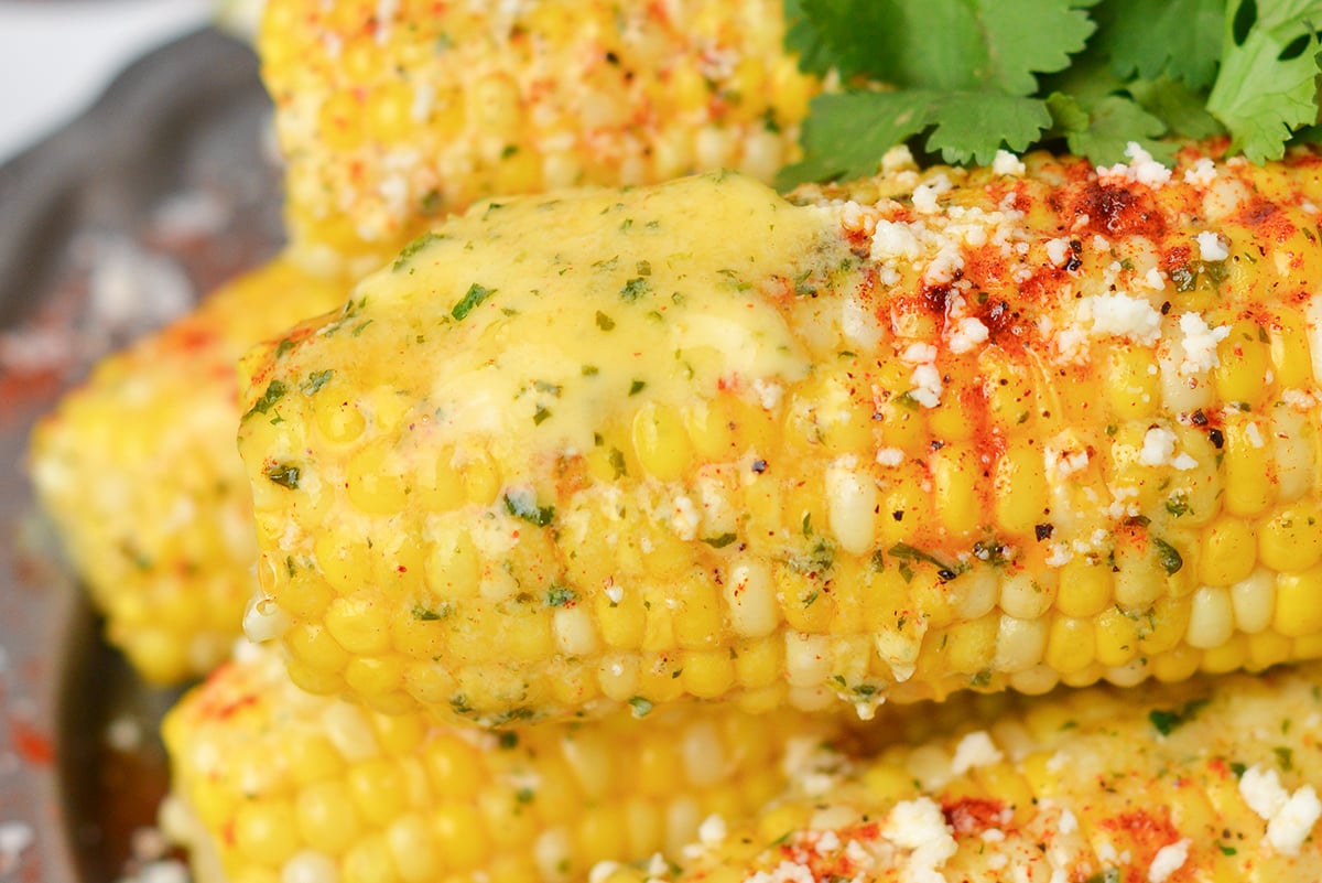 close up of chile lime butter on corn on the cob