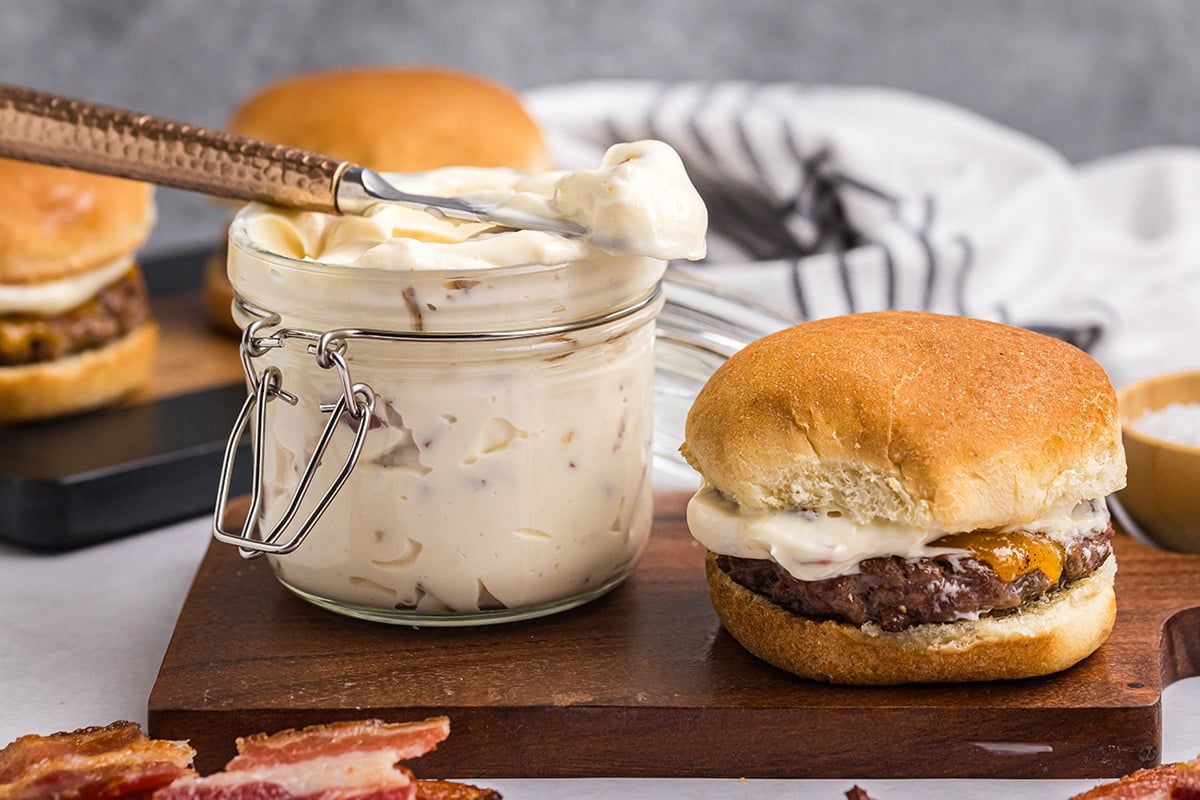 bacon aioli spread on toasted sandwich bun