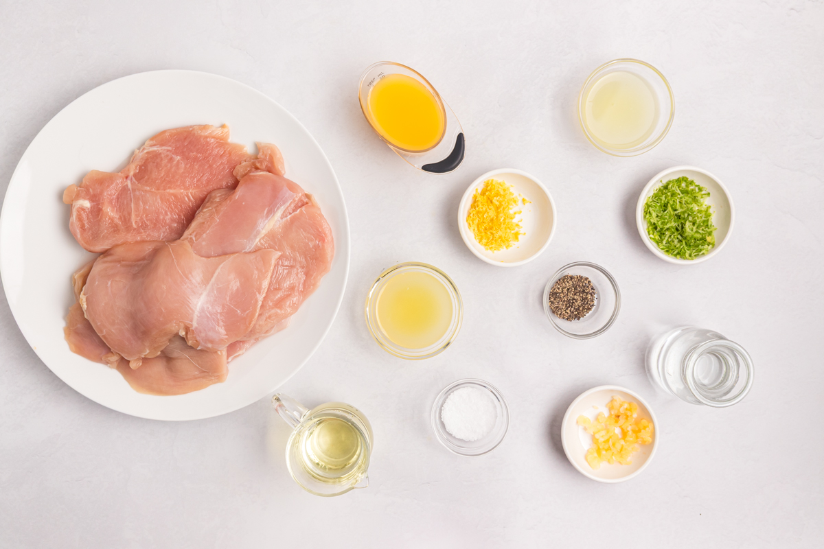 ingredients for citrus chicken marinade with fresh citrus garlic and herbs
