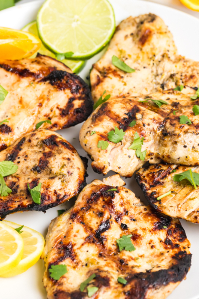 angled shot of plate of grilled chicken
