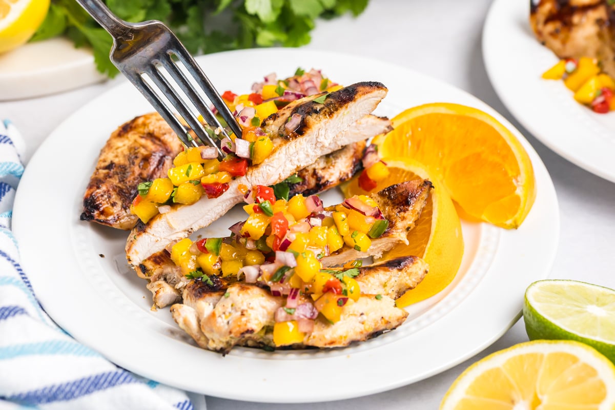 sliced grilled citrus chicken breast showing juicy interior