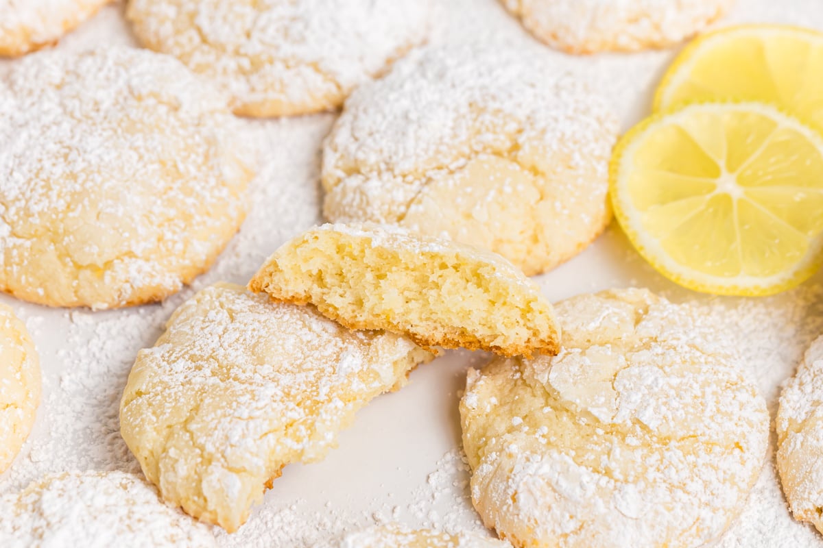 soft lemon cooler cookie broken in half showing tender center