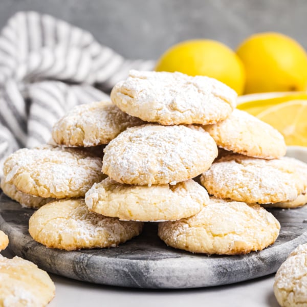 pile of lemon cooler cookies on tray
