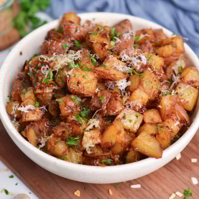 crispy onion soup potatoes served in white bowl