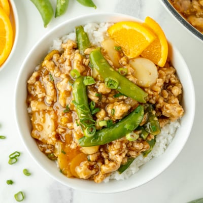 overhead shot of ground orange chicken bowl