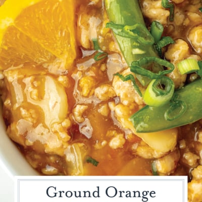 close up shot of ground orange chicken bowl with text overlay